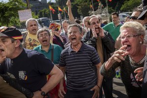 Fascist and right wing activists shout as they protest against Catalan independence in Madrid, Spain, Monday, May 22, 2017.