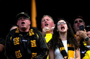 Richmond fans sing the club song.