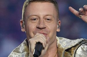US artist Macklemore performs during the NRL grand final