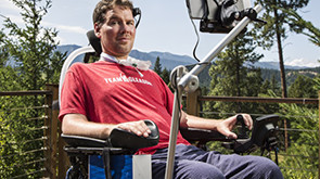 Steve Gleason sits in technology-enhanced wheelchair