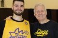 Point to prove: Isaac Humphries, pictured left with coach Andrew Gaze, signed for the Sydney Kings after going undrafted ...