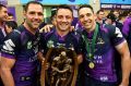 Stellar combination: The Storm's "big three" (from left) Cameron Smith, Cooper Cronk and Billy Slater.