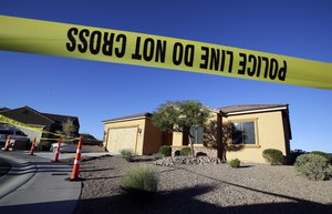 Police tape blocks off the home of Stephen Craig Paddock on Monday, Oct. 2, 2017, in Mesquite, Nev. Paddock killed dozens and injured hundreds on Sunday night when he opened fire at an outdoor country music festival in Las Vegas.