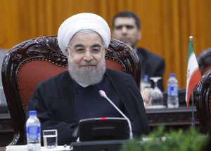 Iranian President Hassan Rouhani speaks during his meeting with Vietnamese Prime Minister Nguyen Xuan Phuc in Hanoi, Vietnam, Thursday, Oct. 6, 2016.