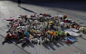 A man pauses at a memorial for the victims of a mass shooting in Las Vegas, Wednesday, Oct. 4, 2017, in Las Vegas.