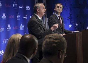 File - Gubernatorial candidates Republican Ed Gillespie, left, and Democrat Lt. Gov. Ralph Northam debate in McLean, Va., Tuesday, Sept. 19, 2017. T