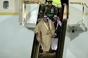 Saudi King Salman steps out of a plane upon arrival in Moscow's Government Vnukovo airport, Russia, Wednesday, Oct. 4, 2017. Salman will meet Russian President Vladimir Putin on Thursday, Oct. 5, 2017.