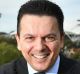 Nick Xenophon, posing for a photograph after announcing his plan to quit the Senate, could seize an influential role in ...