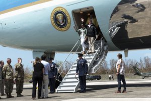 President Donald J. Trump and First Lady Melania Trump arrive at Muniz Air National Guard Base in Carolina, Puerto Rico, Oct. 3, 2017.