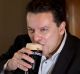 Nick Xenophon toasts the news that he's a British citizen earlier this year. 