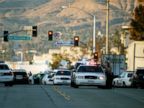 PHOTO: Law enforcement officers close Mountain View Avenue during the pursuit of suspects in the shooting at the Inland Regional Center, Dec. 2, 2015, in San Bernardino, California.