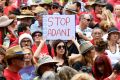 Anti-Adani protestors gathered at Crosby Park in Brisbane on Saturday.