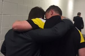 Alastair Clarkson and Damien Hardwick share a moment after the grand final.