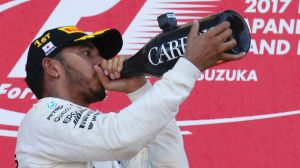 Champagne showers: Lewis Hamilton celebrates a win and essentially locking in the title.