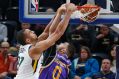 Towering: Utah Jazz centre Ruby Gobert stands at 216 centimetres.