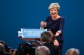 Prime Minister Theresa May was handed a cough sweet in a failed attempt to stop her cough during a speech at her party's ...