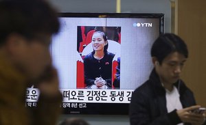 A TV news program shows Kim Yo Jong, North Korean leader Kim Jong Un's younger sister, at Seoul Railway Station in Seoul, South Korea, Thursday, Nov. 27, 2014.