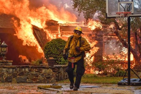 A fireman battles California wildfires (AP: Jeff Gritchen/The Orange County Register)