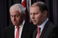 Prime Minister Malcolm Turnbull with Minister Josh Frydenberg at Parliament House in Canberra.