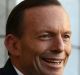 Tony Abbott, with his former environment minister Greg Hunt, says climate change "might even be beneficial".