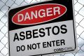 A Chifley homeowner has been hit with an improvement notice after incorrectly removing an asbestos fence.