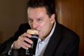 Nick Xenophon toasts the news that he's a British citizen earlier this year. 