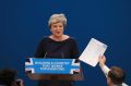 Comedian Simon Brodkin, also known as Lee Nelson confronts British Prime Minister Theresa May during her keynote speech, ...