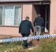 Police at the Oberon home where the boy was killed. 