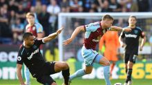 Burnley's Johann Berg Gudmundsson, right, and West Ham United's Winston Reid battle for the ball during their English ...