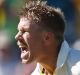 Raw emotion: Dave Warner celebrates scoring a century in the 2013 Ashes Test in Perth.