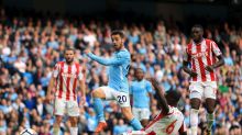 Manchester City's Bernardo Silva scores his side's seventh goal of the game during the English Premier League soccer ...