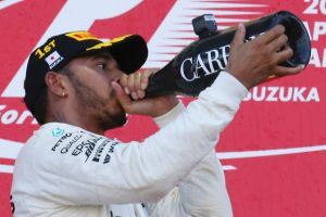 Champagne showers: Lewis Hamilton celebrates a win and essentially locking in the title.