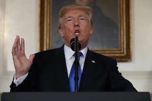 FILE - In this Friday, Oct. 13, 2017 file photo, President Donald Trump makes a statement on Iran policy in the Diplomatic Reception Room of the White House in Washington. While U.S.