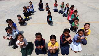 Nepalese children mark World Earth Day at school