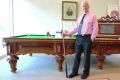 George Taylor with a rare, circa mid-1880s, Alcocks Exhibition Prize billiard table.