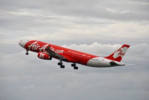 Indonesia AirAsia X Airbus A330-300 (PK-XRA) after take off from Ngurah Rai Airport, Tuban, Badung Regency, Bali, Indonesia