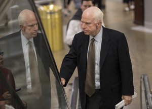 Senate Armed Services Committee Chairman John McCain, R-Ariz., arrives at the Capitol for a briefing with Senate Majority Leader Mitch McConnell, R-Ky., who is releasing the Republicans' healthcare bill, the party's long-awaited attempt to scuttle much of President Barack Obama's Affordable Care Act, in Washington, Thursday, June 22, 2017