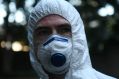 Greenpeace activists deliver a load of coal to the front of the Commonwealth Bank's Harbour Street office in Sydney on ...