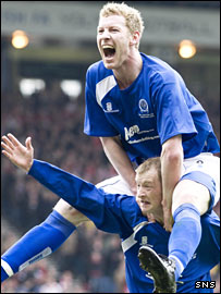 Sean O'Connor and John Stewart celebrate a great day for Queens