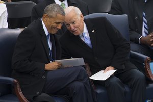 The 44th President of the United States Barack H. Obama and former Vice President Joe R. Biden smile during the 58th Presidential Inauguration at the U.S. Capitol Building, Washington, D.C., Jan. 20, 2017.