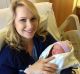 Kaylee Bay with her newborn daughter Gretsel.