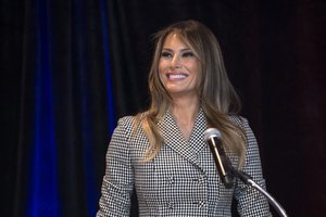 First Lady Melania Trump reacts to applause during her speech to US team families and competitors in the 2017 Invictus Games in Toronto, Canada Sept. 23, 2017.