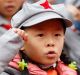 Young Chinese students dressed in Red Army costumes at a school ceremony in Gulin county, Luzho, Sichuan province.