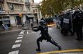 Spanish riot police used  rubber bullets against people trying to reach polling stations on October 1.