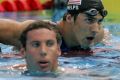 Friend or foe: Long term rivals in the pool, Michael Phelps and Grant Hackett have a lot to do with each other in private.