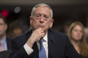 Defense Secretary-designate James Mattis listens to questions from Sen. Kirsten Gillibrand, D-N.Y., about his views on women and gays serving in the military, at his confirmation hearing before the Senate Armed Services Committee on Capitol Hill in Washington, Thursday, Jan. 12, 2017.