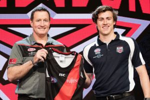 Essendon coach John Worsfold with 2016 No.1 draft pick Andrew McGrath.