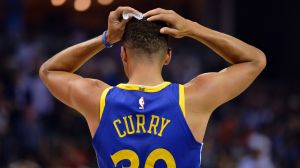 Golden State Warriors guard Stephen Curry has been fined $US50,000 for throwing his mouthguard.