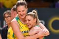 Kate Moloney of Australia celebrates win with Caitlin Bassett after the netball Constellation Cup.