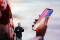 Phil Schiller, Apple's senior vice president of worldwide marketing, announces features of the new iPhone X at the Steve ...